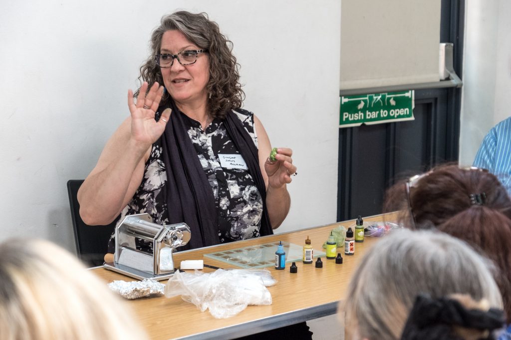 Ginger Davis Allman gives a demo at the London Polymer Clay Group meeting.