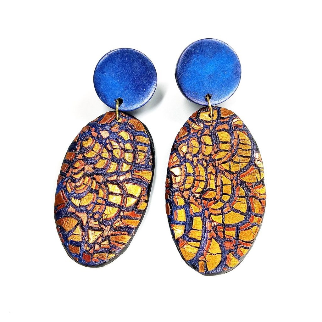 Polymer clay earrings made with a crackle effect and Pearl Ex by Jacquard Products.