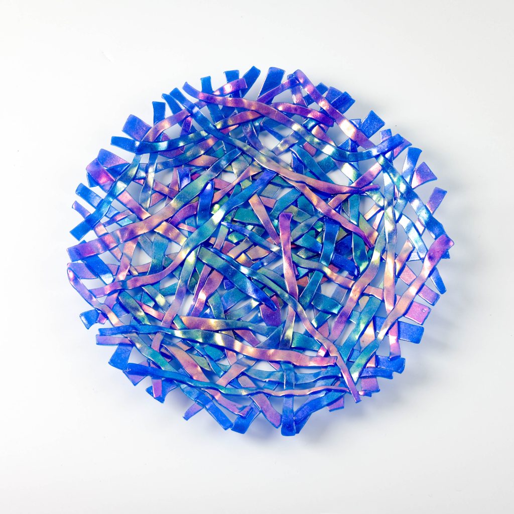 Polymer clay wall art called Color Ribbons in blue Cernit translucent.