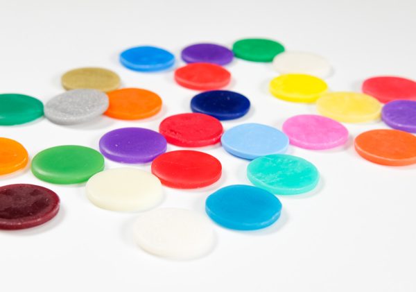 Circles of baked colored translucent polymer clay