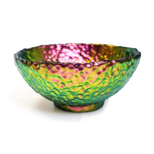 Colorshifting multichrome polymer clay bowl in tones of pink, gold, and green.